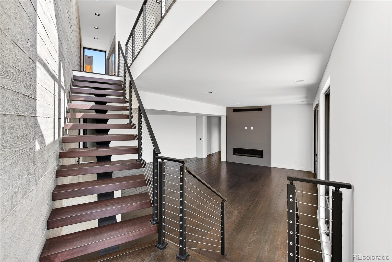 545 Strada Rossa Road Golden, CO 80401 - Photo 42 of 49 a view of entryway and hall with wooden floor