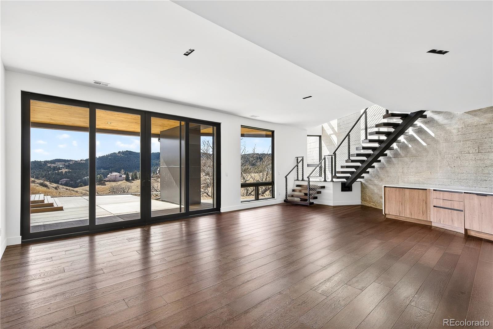 545 Strada Rossa Road Golden, CO 80401 - Photo 46 of 49 a view of an entryway with wooden floor