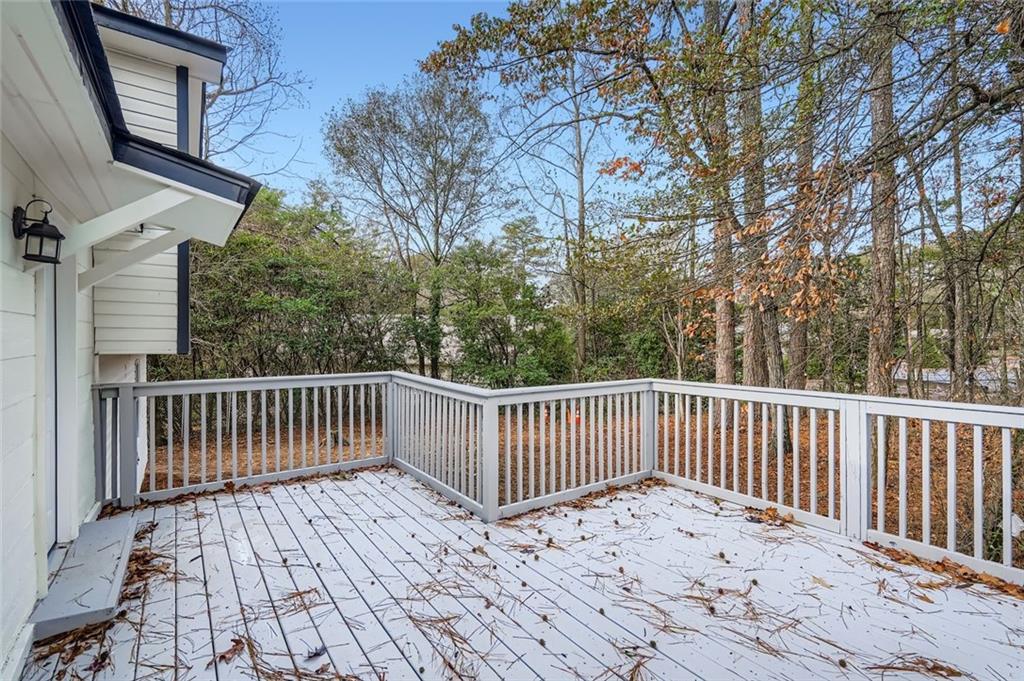 862 Sheppard Way Stone Mountain, GA 30083 - Photo 20 of 22 a view of backyard with deck and wooden floor