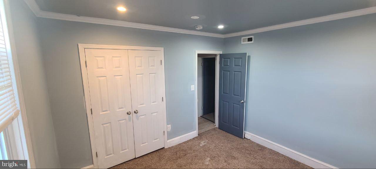 4700 York Road, Unit 2 Baltimore, MD 21212 - Photo 4 of 12 an empty room with closet area