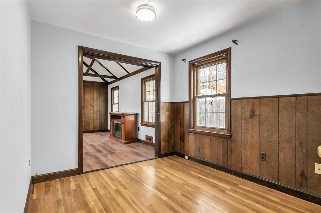 354 Seames Drive Manchester, NH 03103 - Photo 8 of 30 a view of empty room with wooden floor and fan