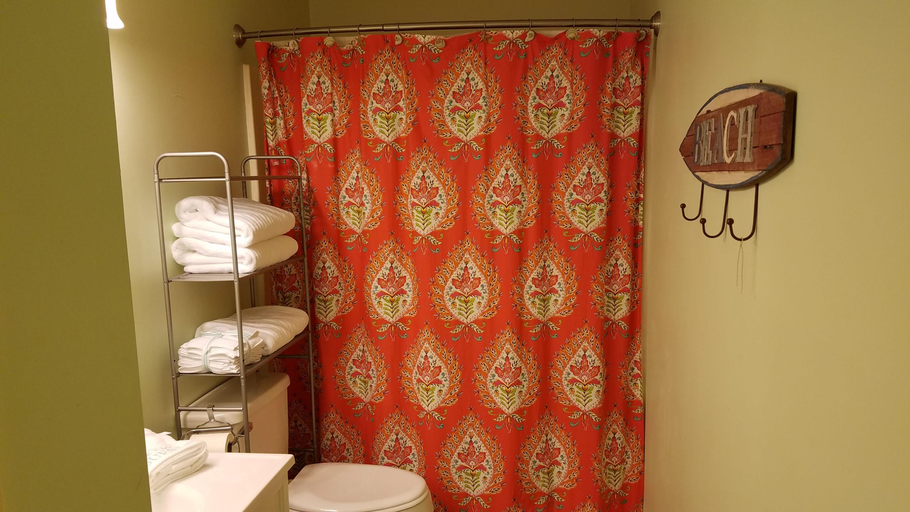 17670 Front Beach Road, Unit D3 Panama City Beach, FL 32413 - Photo 10 of 12 a bathroom with a toilet and a sink