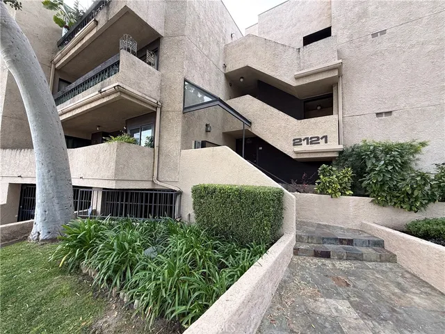 a view of building with large windows