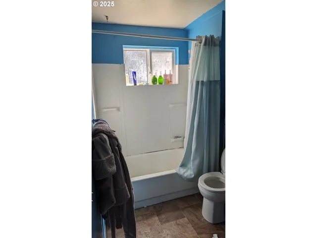 a bathroom with a toilet