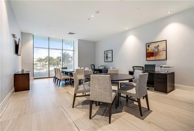 730 North Ocean Boulevard, Unit 1201 Pompano Beach, FL 33062 - Photo 12 of 40 a view of a dining room with furniture window and outside view