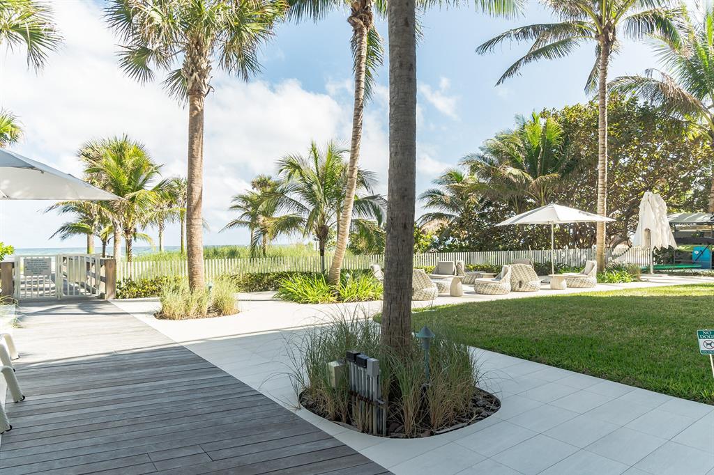 730 North Ocean Boulevard, Unit 1201 Pompano Beach, FL 33062 - Photo 19 of 40 a view of a yard with palm tree
