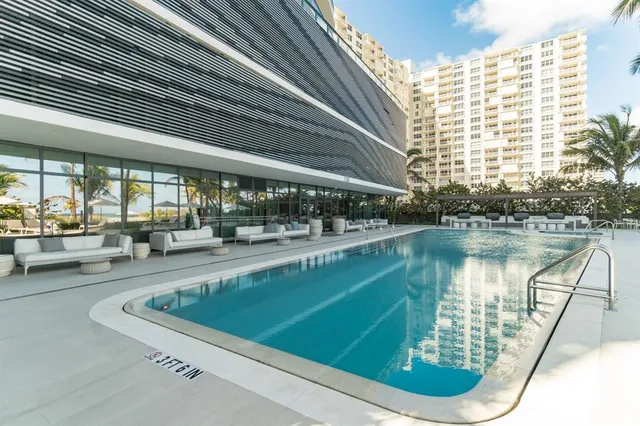 a view of a swimming pool and outdoor space