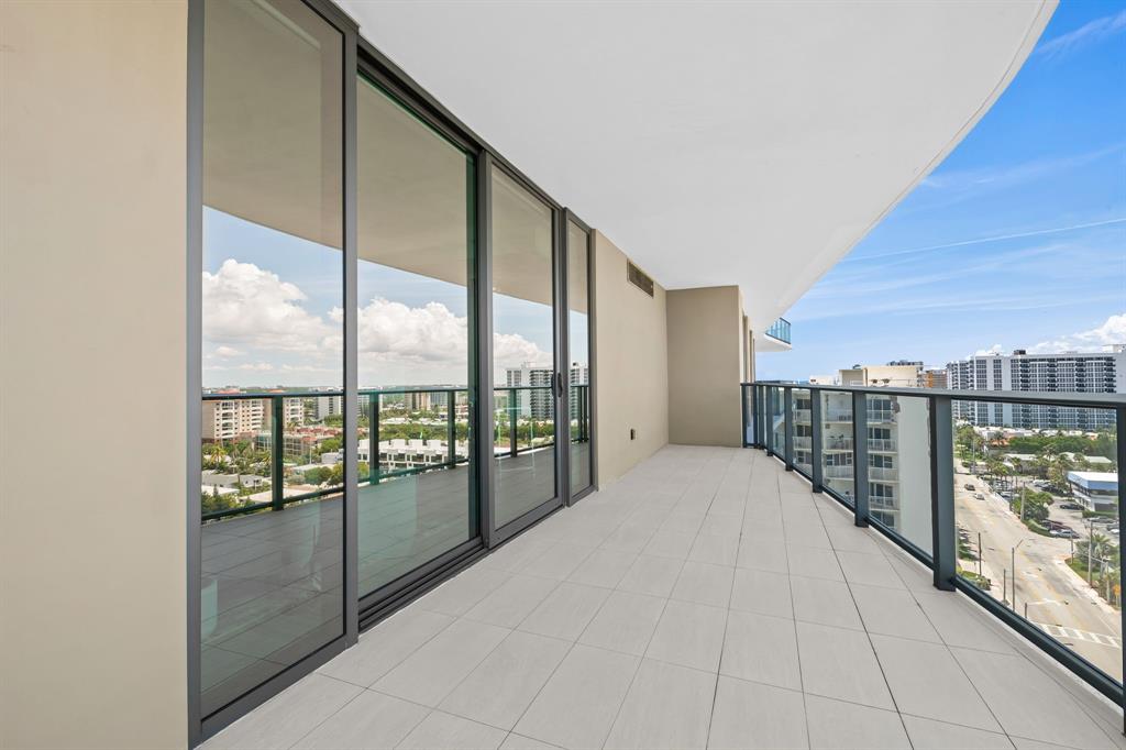 730 North Ocean Boulevard, Unit 1201 Pompano Beach, FL 33062 - Photo 31 of 40 a view of a city from a balcony