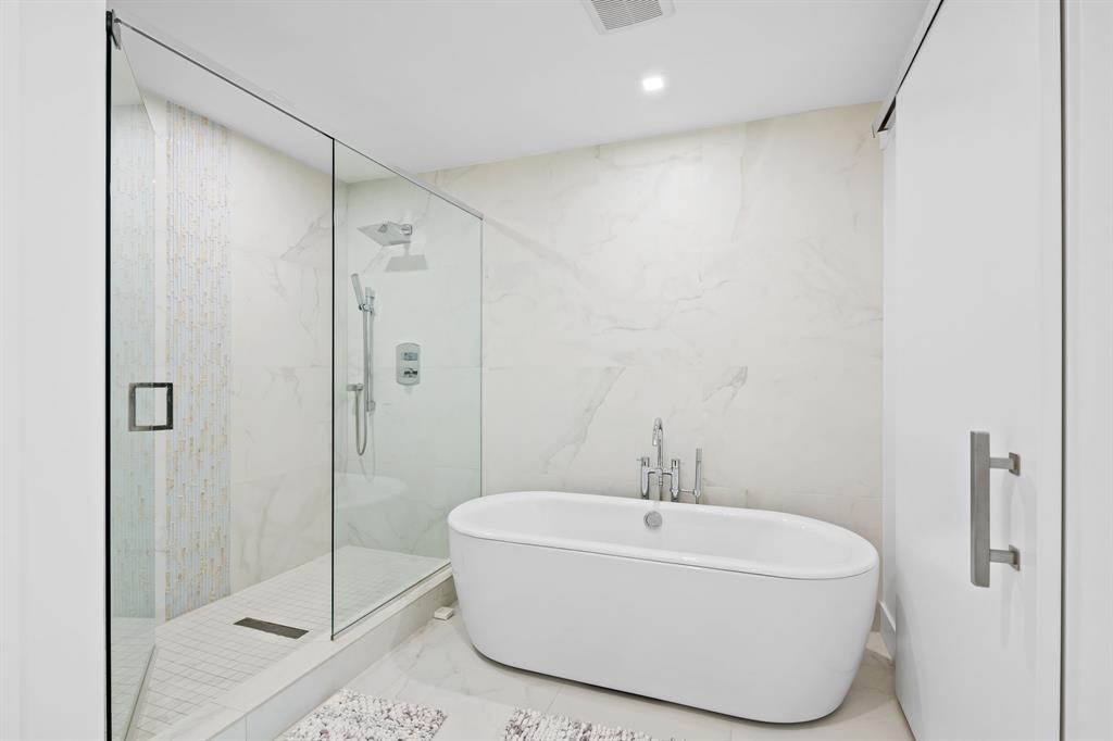 730 North Ocean Boulevard, Unit 1201 Pompano Beach, FL 33062 - Photo 40 of 40 a white bath tub sitting next to a shower