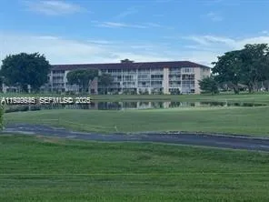 a view of a big building with a big yard