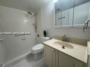 13550 Southwest 6th Court, Unit 113A Pembroke Pines, FL 33027 - Photo 6 of 12 a bathroom with a sink toilet and shower