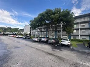 a view of car parked in front of house