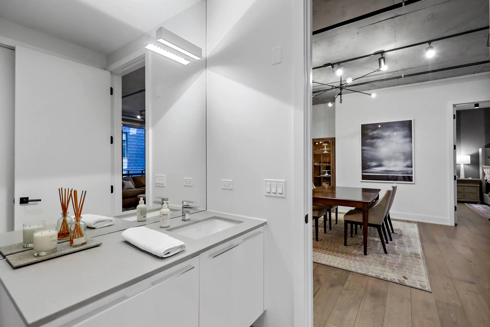 111 South Peoria Street, Unit 406 Chicago, IL 60607 - Photo 24 of 26 a view dining table and chairs in a room
