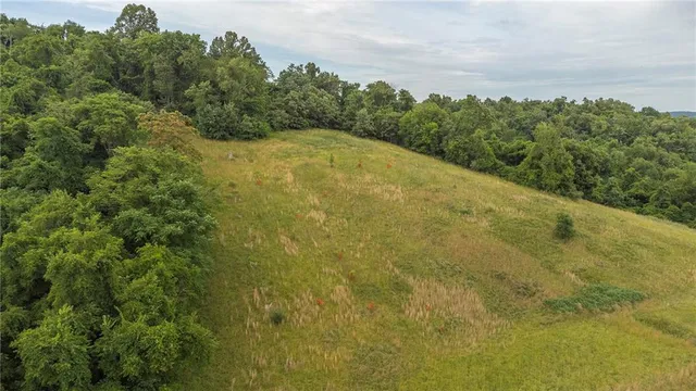a view of mountain with lake view
