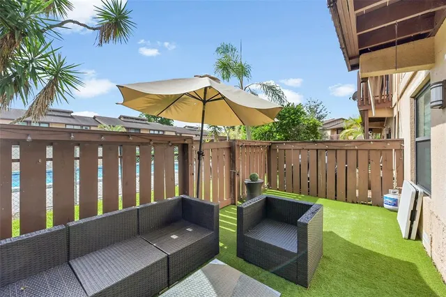 a view of a bench in the patio