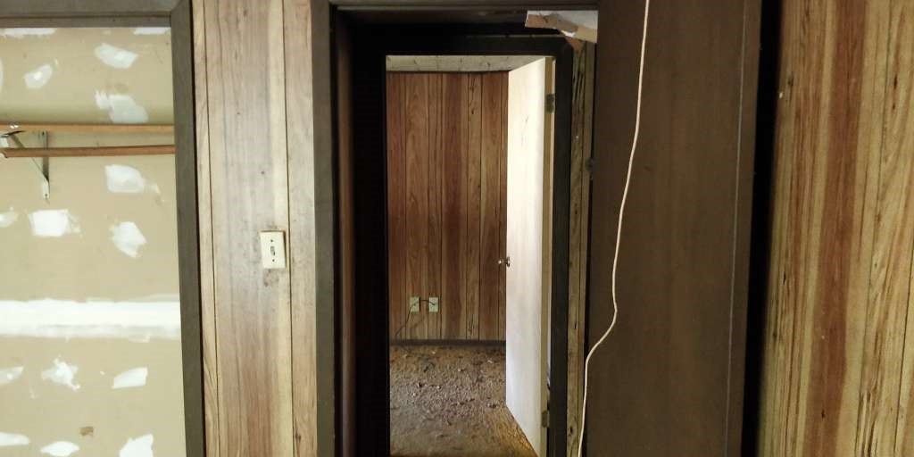 616 Post Oak Road Grapeland, TX 75844 - Photo 7 of 10 a view of a bathroom with a glass door
