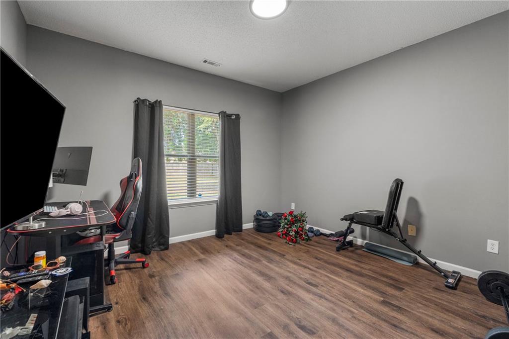 234 Owens Road Fort Mitchell, AL 36856 - Photo 17 of 25 Office area featuring wood finished floors and baseboards