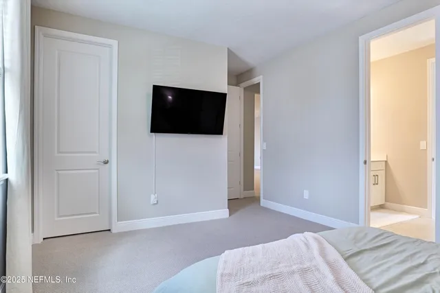 a view of a livingroom with a flat screen tv