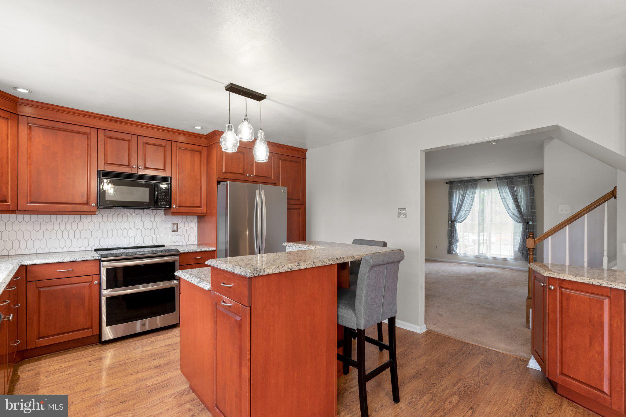 4406 Silver Teal Road Baltimore, MD 21236 - Photo 8 of 30 SS Appliances and updated Backsplash