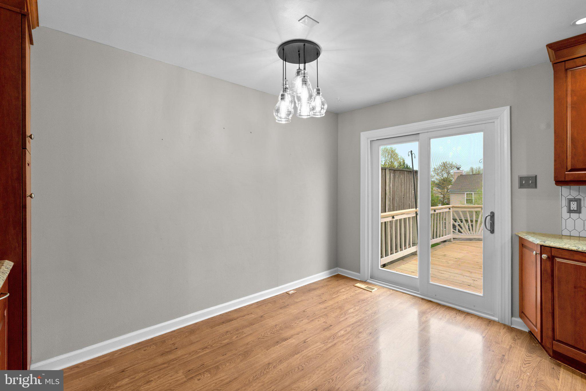 4406 Silver Teal Road Baltimore, MD 21236 - Photo 10 of 30 Room for Table and Deck Access