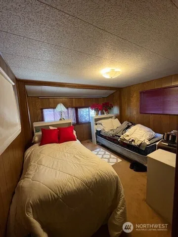a bathroom with a sink double vanity and mirror