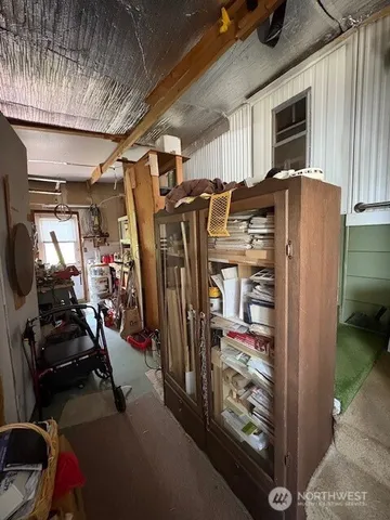 a view of a backyard with pathway