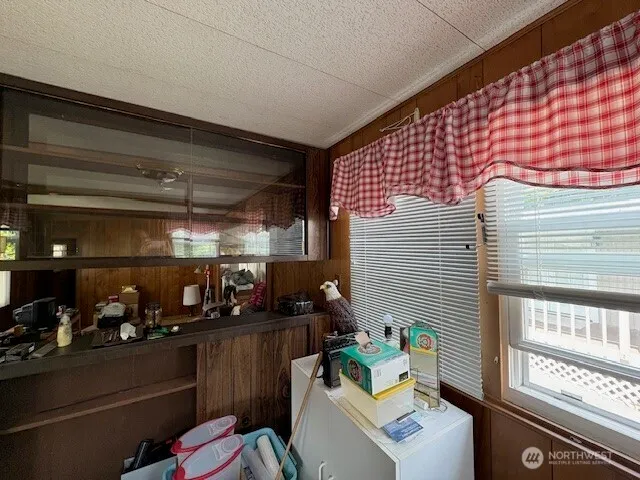 a room with lots of different colored cloths