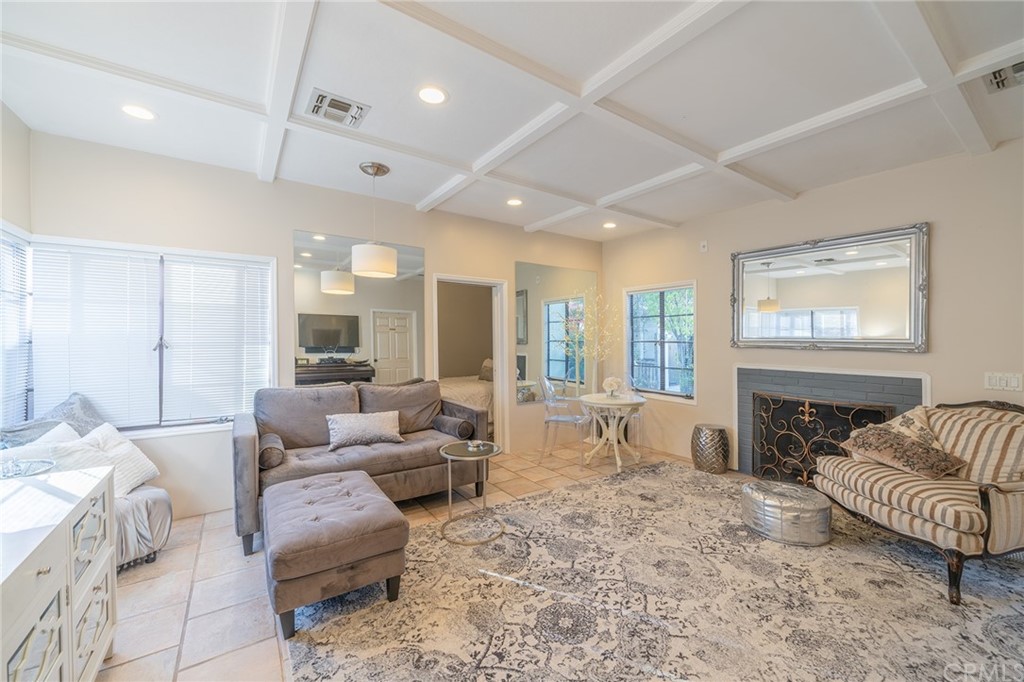 1853 Allen Avenue Pasadena, CA 91104 - Photo 17 of 38 a living room with furniture and a fireplace