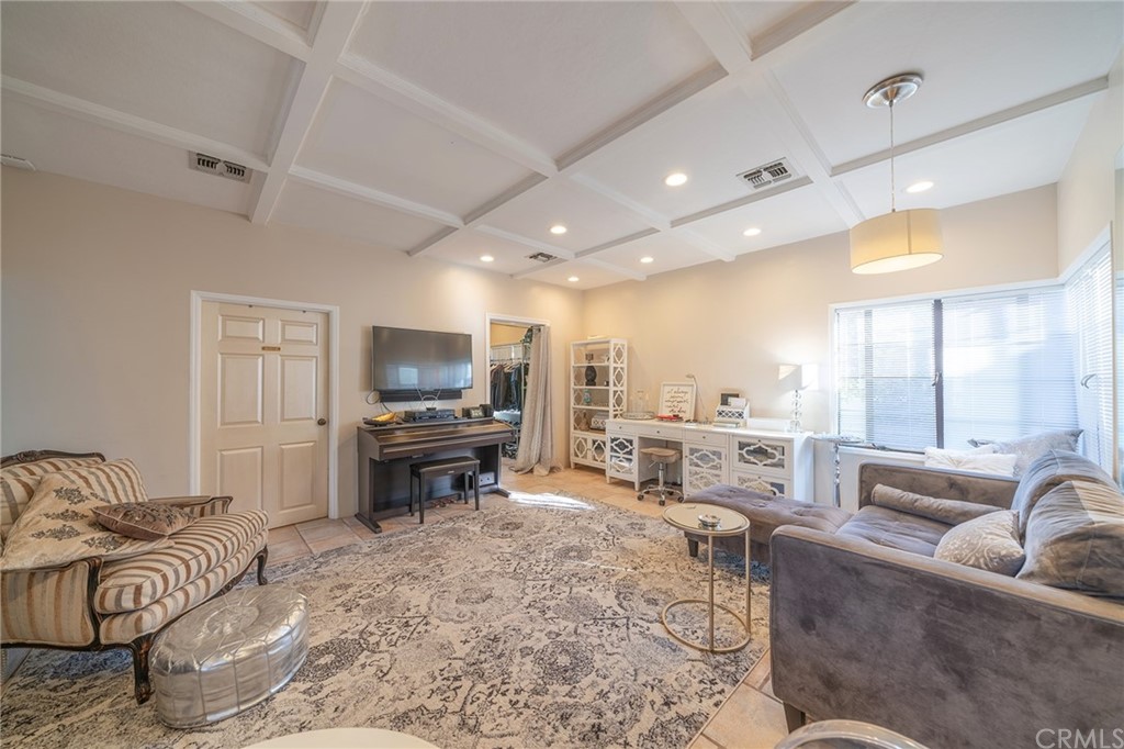 1853 Allen Avenue Pasadena, CA 91104 - Photo 18 of 38 a living room with furniture and a flat screen tv