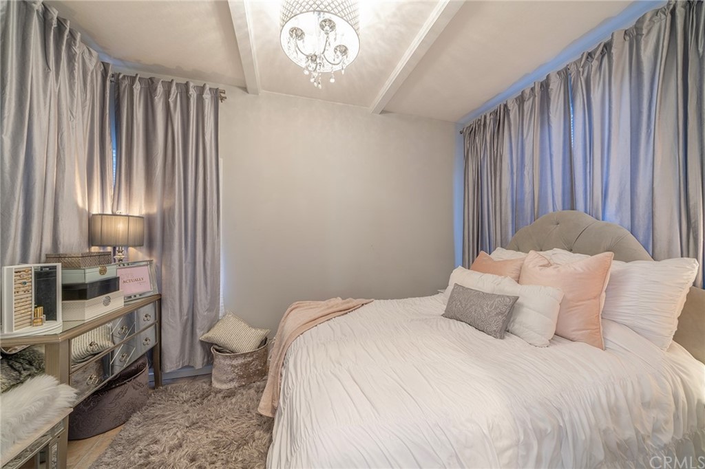 1853 Allen Avenue Pasadena, CA 91104 - Photo 21 of 38 a bedroom with a bed and a television