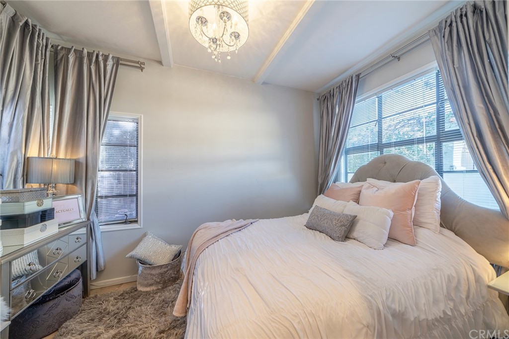 1853 Allen Avenue Pasadena, CA 91104 - Photo 23 of 38 a bedroom with a bed and a window