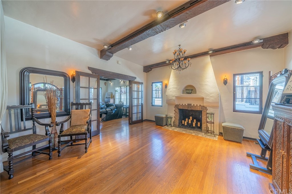 1853 Allen Avenue Pasadena, CA 91104 - Photo 5 of 38 a living room with furniture and a fireplace