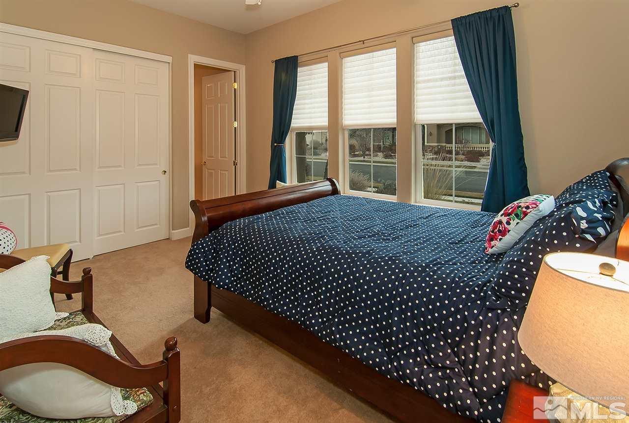 2690 Strathmore Court Reno, NV 89521 - Photo 17 of 25 a bedroom with bed and wooden floor