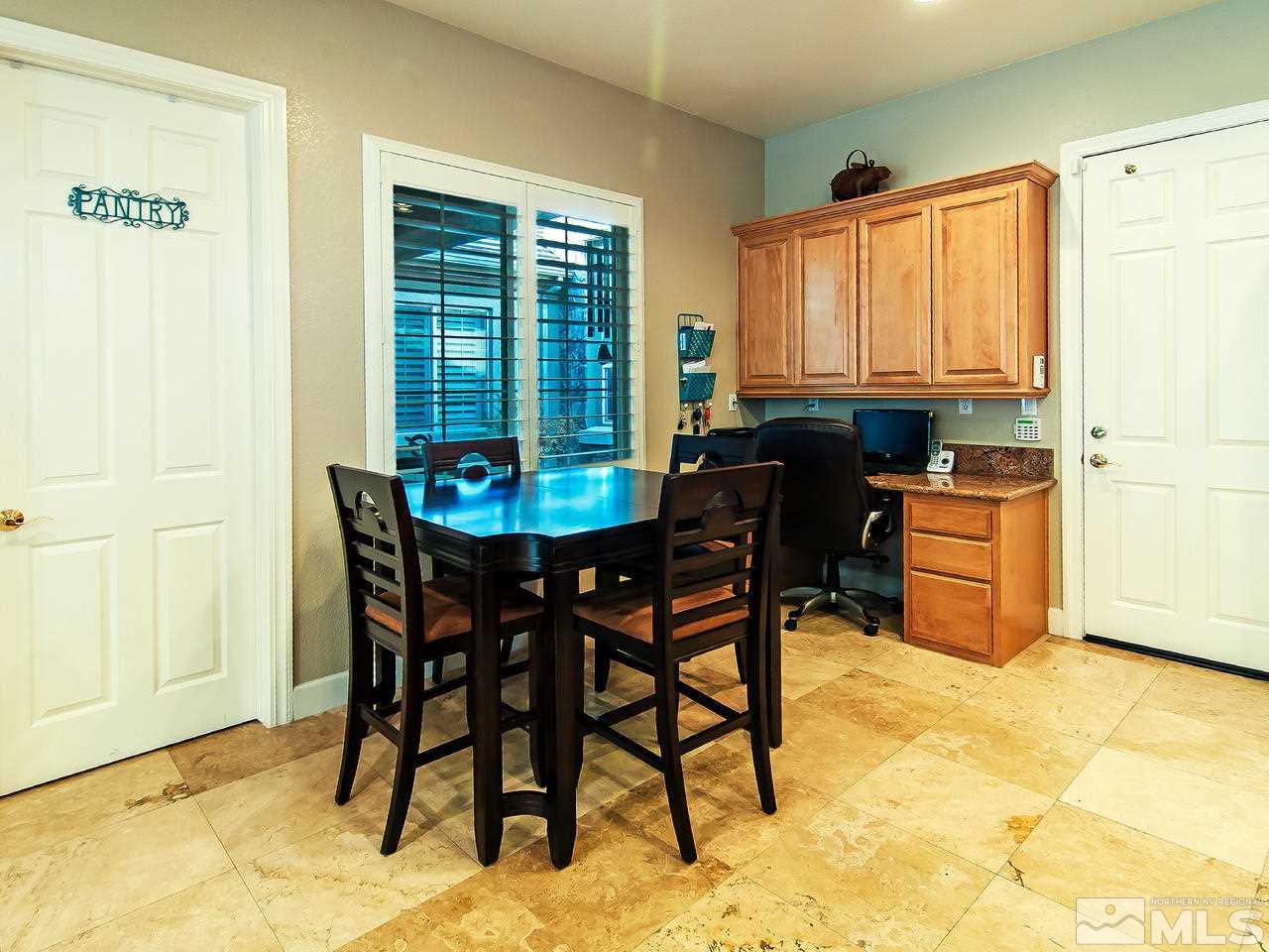 2690 Strathmore Court Reno, NV 89521 - Photo 7 of 25 a dining room with furniture and window