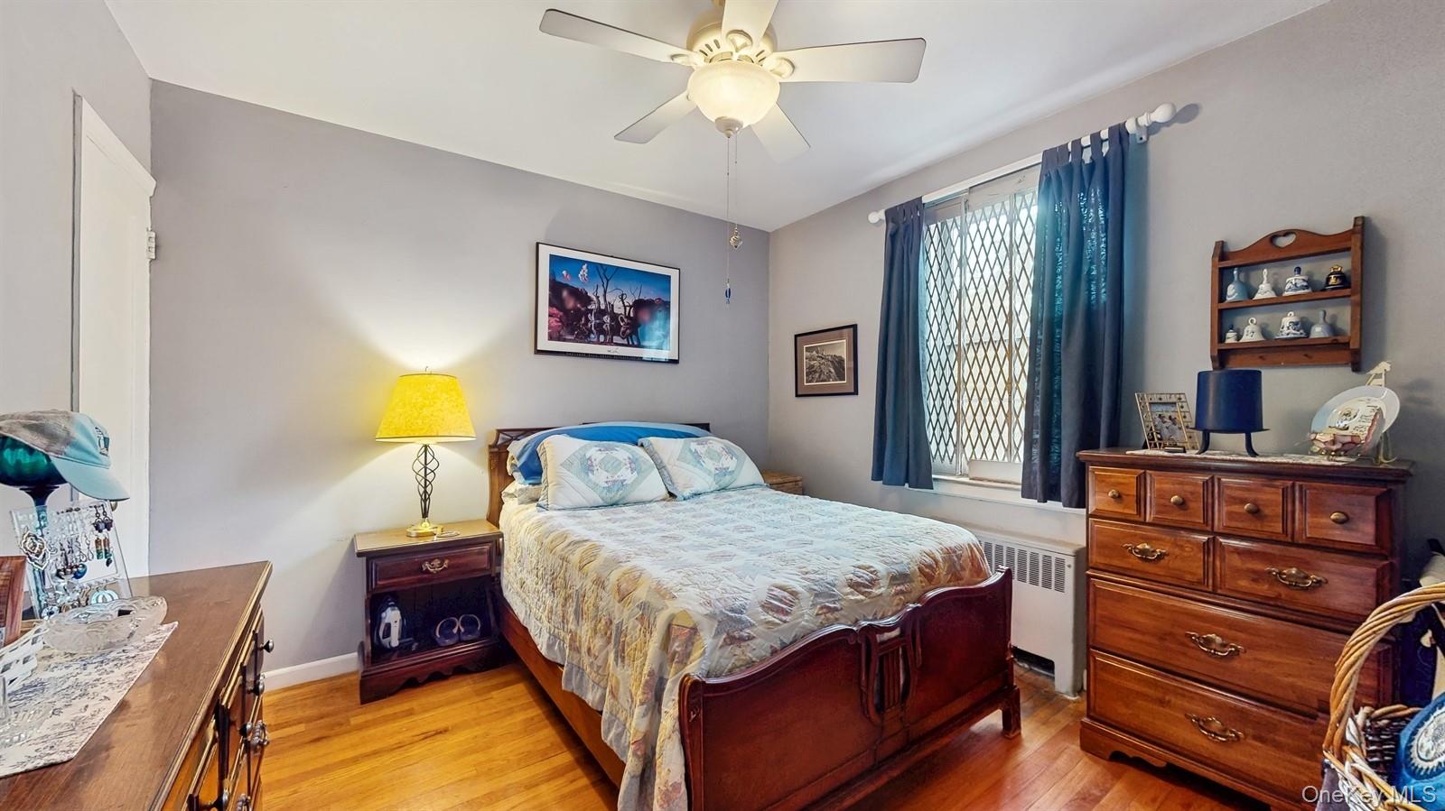 755 Bronx River Road, Unit 6C Bronxville, NY 10708 - Photo 16 of 22 a bedroom with a bed and a dresser in it