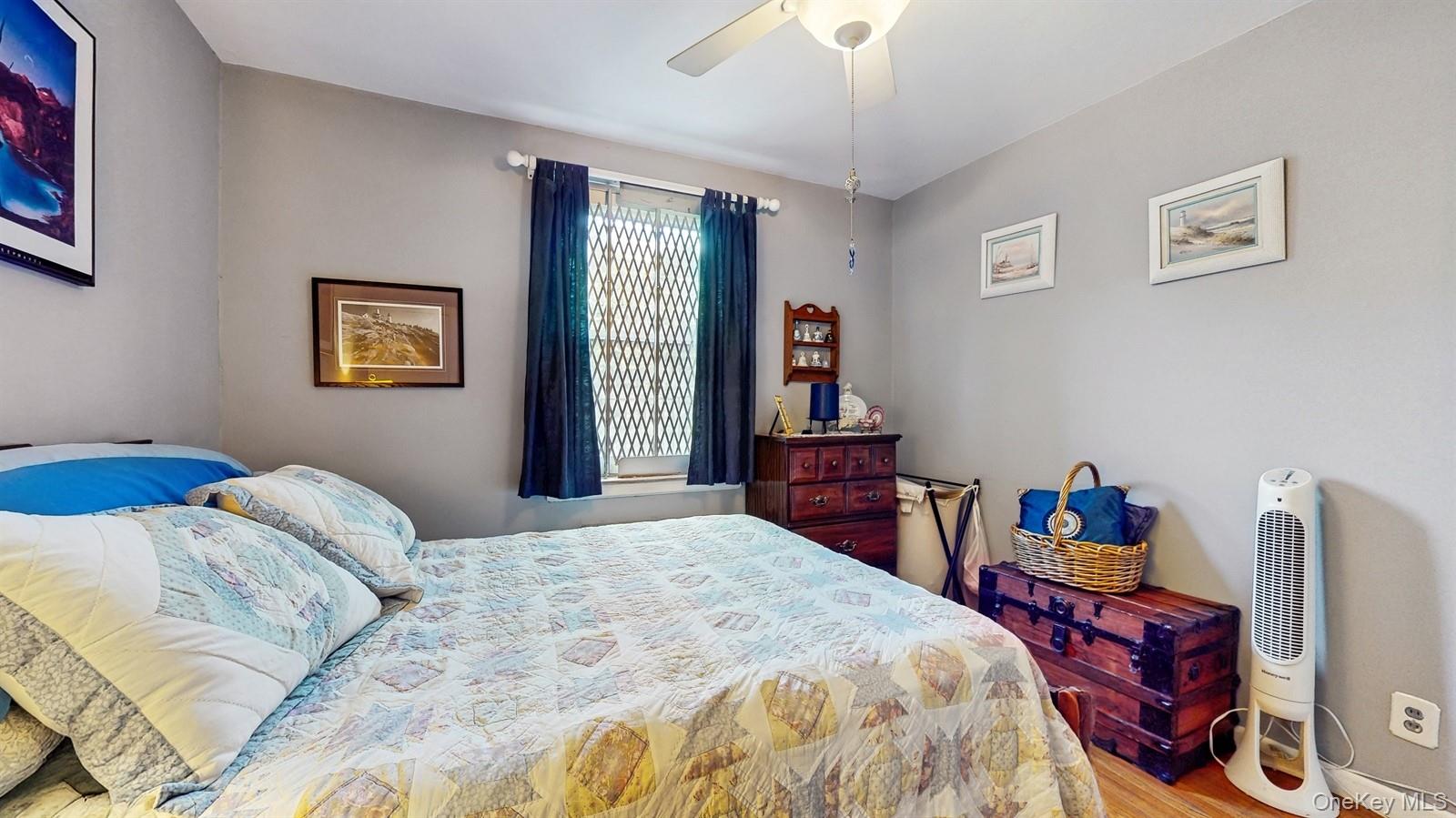 755 Bronx River Road, Unit 6C Bronxville, NY 10708 - Photo 18 of 22 a bedroom with bed and a window