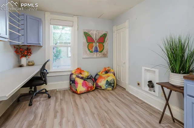 a bathroom with a sink and mirror with toilet