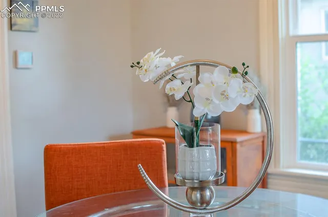 a vase of flowers sitting on a table