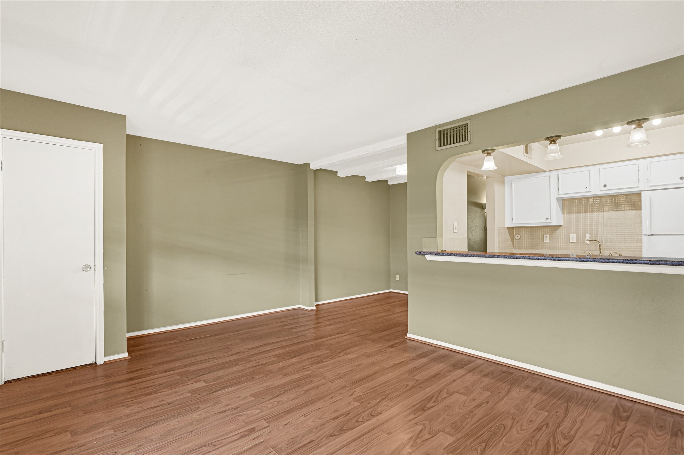 11550 Chimney Rock Road, Unit 232 Houston, TX 77035 - Photo 6 of 30 a view of a kitchen with wooden floor