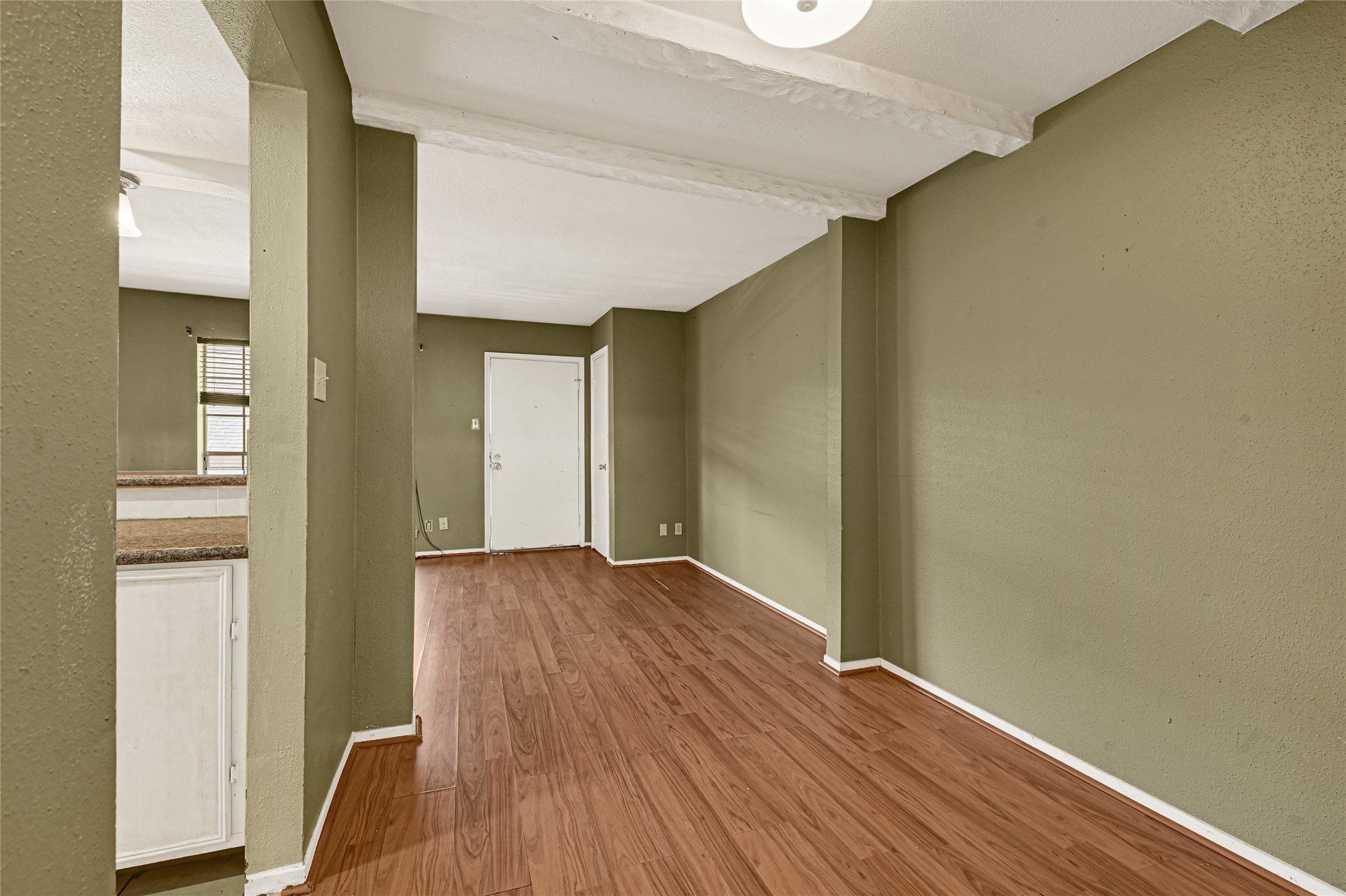 11550 Chimney Rock Road, Unit 232 Houston, TX 77035 - Photo 9 of 30 a view of hallway with wooden floor