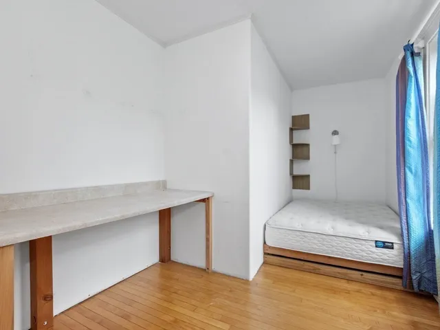 a en suite bathroom with a sink and a mirror