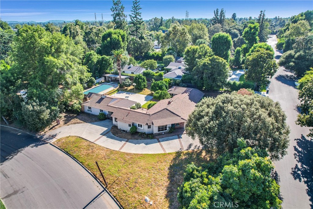an aerial view of a house with a garden