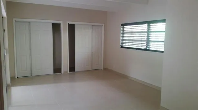 an empty room with windows