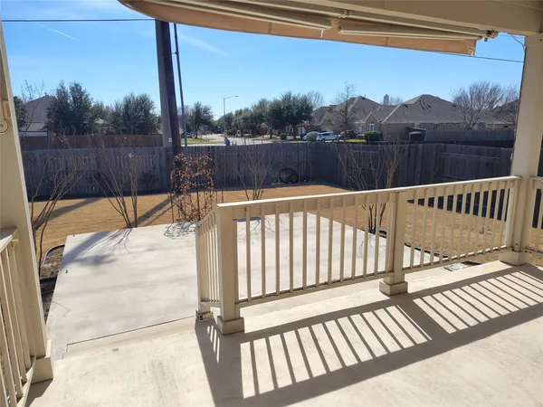 a view of a two chairs on the roof deck