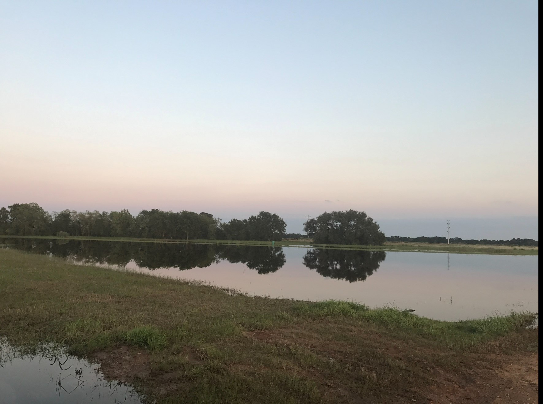 0 Prairie Switch Road Northeast El Campo, TX 77437 - Photo 1 of 6 a view of lake with mountain in the background