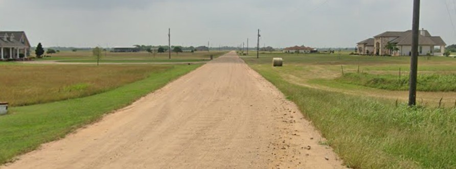 0 Prairie Switch Road Northeast El Campo, TX 77437 - Photo 2 of 6 a view of a lake with a large bridge