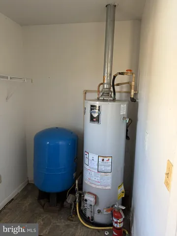 a room with a sink and a mirror