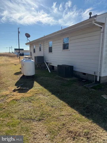 a view of a backyard of the house