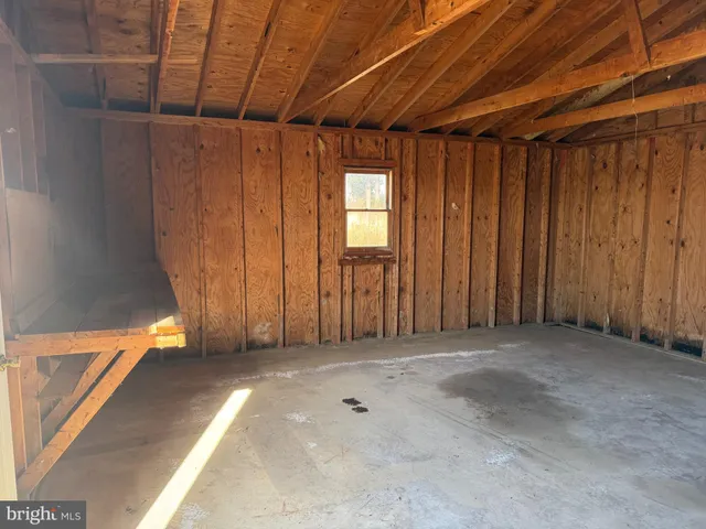 a view of swimming pool with a yard