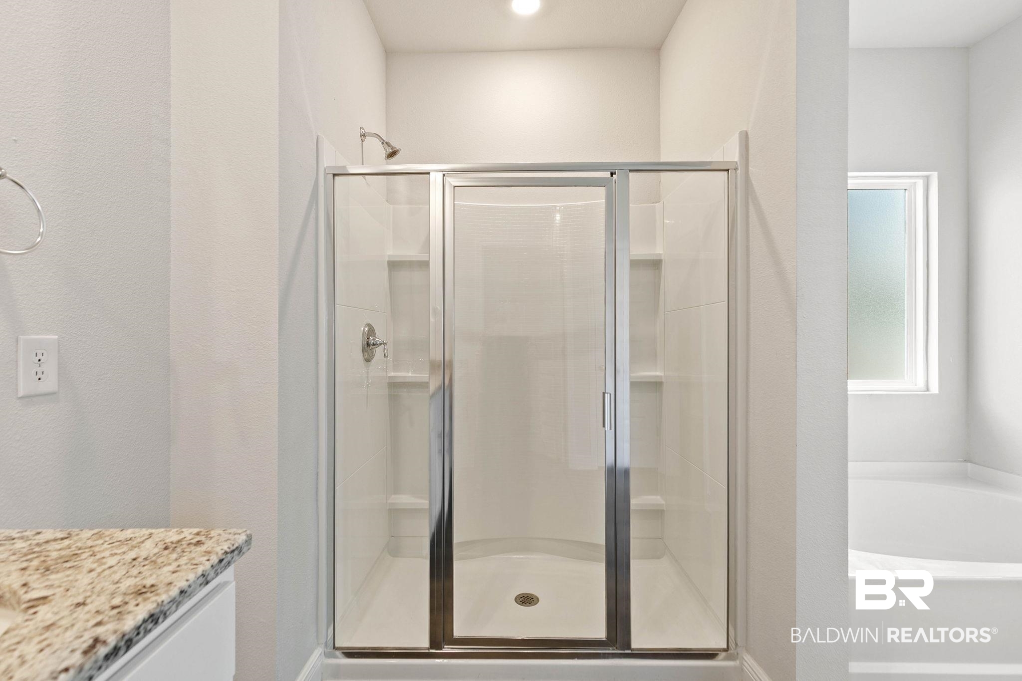 9448 Amethyst Drive Daphne, AL 36526 - Photo 28 of 61 Bathroom featuring a stall shower, a garden tub, and vanity